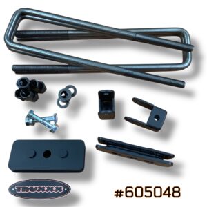 Truxxx #605048 1-inch rear lift kit for 2013-2026 Ram 3500, 4500, and 5500 Dually and Chassis Cab. Image shows two fully-welded 1/4-inch USA steel 1-inch rear blocks with a durable coat finish, two rear shock relocation brackets, and four heavy-duty 3/4-inch U-bolts with high-tensile hardware.