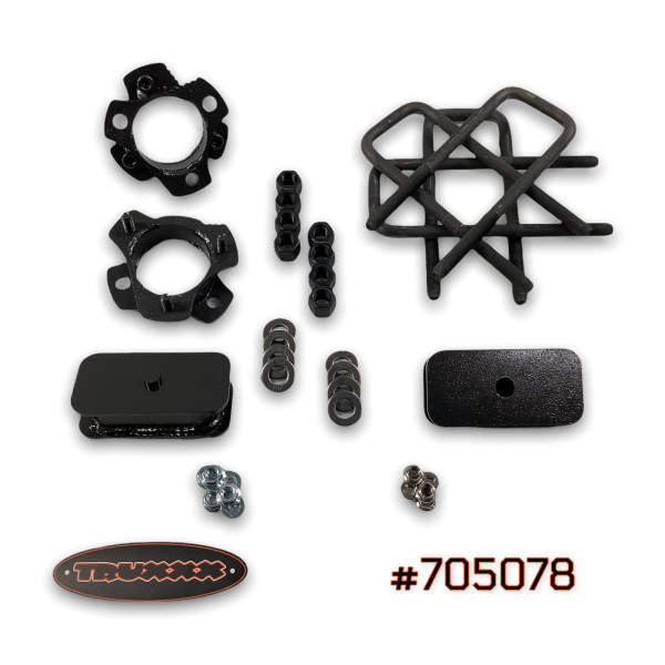 705078.png Truxxx 705078 3.0-inch front and 1.5-inch rear lift kit for 2022-2026 Nissan Frontier, featuring steel spacers and rear blocks.
