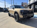 2027 Kia Telluride SUV with Truxxx 2.5 inch front and rear lift kit 306031 for an aggressive off-road ready stance.