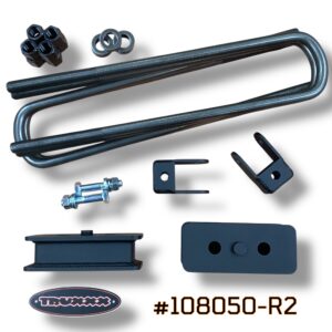 Product photo of Truxxx kit #108050-R2 for the 2024–2026 Ford F-450 and F-550 DRW/Dually. This 2.0-inch rear lift kit includes two precision-fabricated rear lift blocks made of heavy-gauge USA Mill Certified Steel. The image features two heavy-duty rear shock brackets , four custom-matched high-strength U-bolts , and Grade 10.9/12.9 high-tensile fasteners for a 100% bolt-on installation.